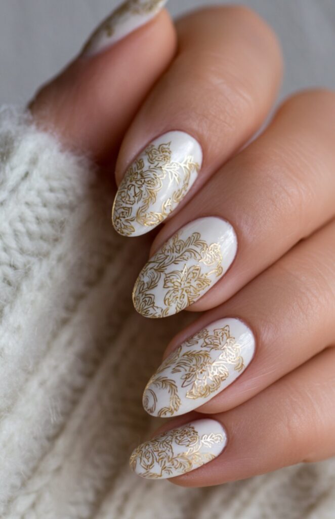 White Nails with Delicate Gold Lace Design