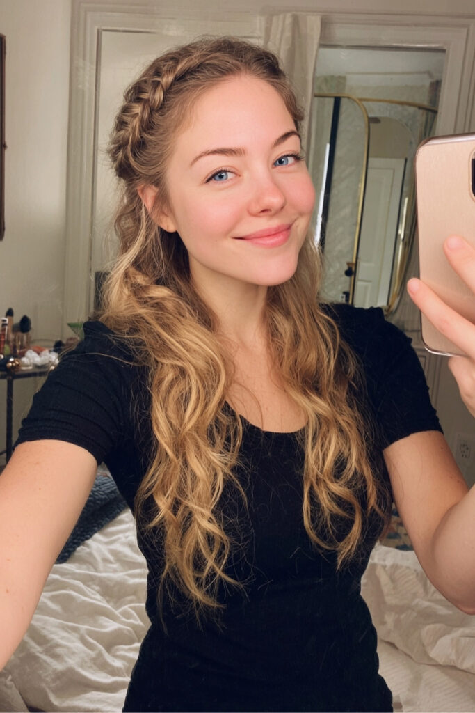 Side-Swept Braided Crown with Cascading Curls