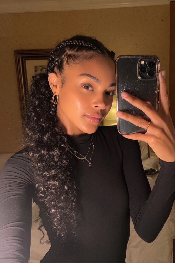 Sleek Side Cornrow with Voluminous Curls